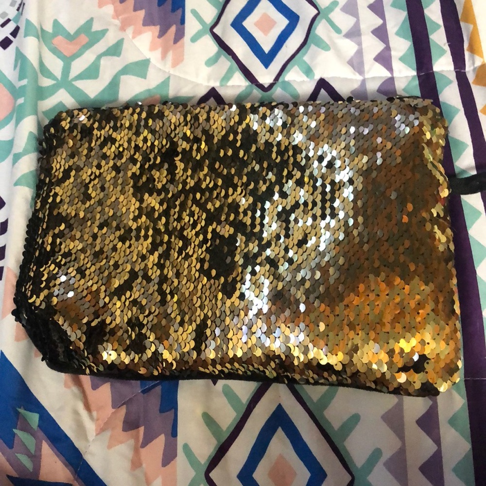 Black and gold makeup bag